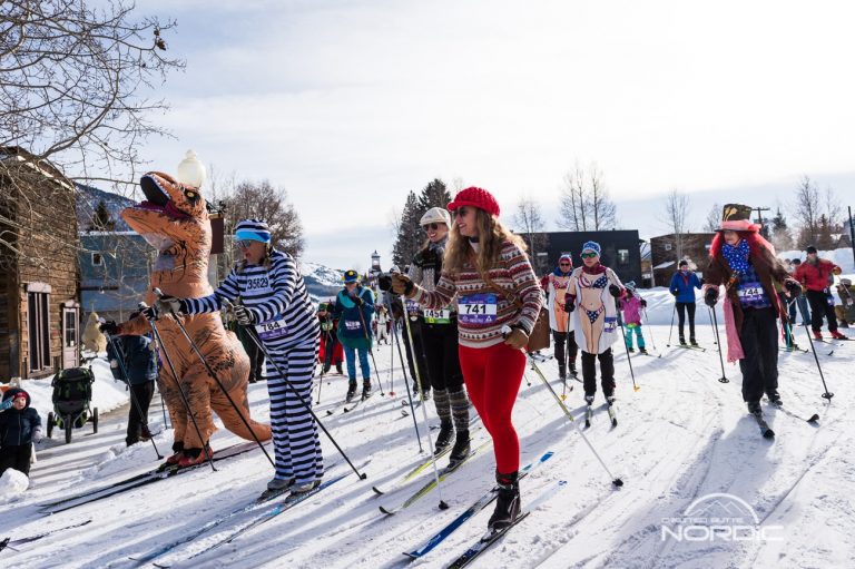 Alley Loop skiers in costume on course in Crested Butte