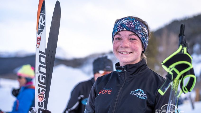 Youth skier with big smile