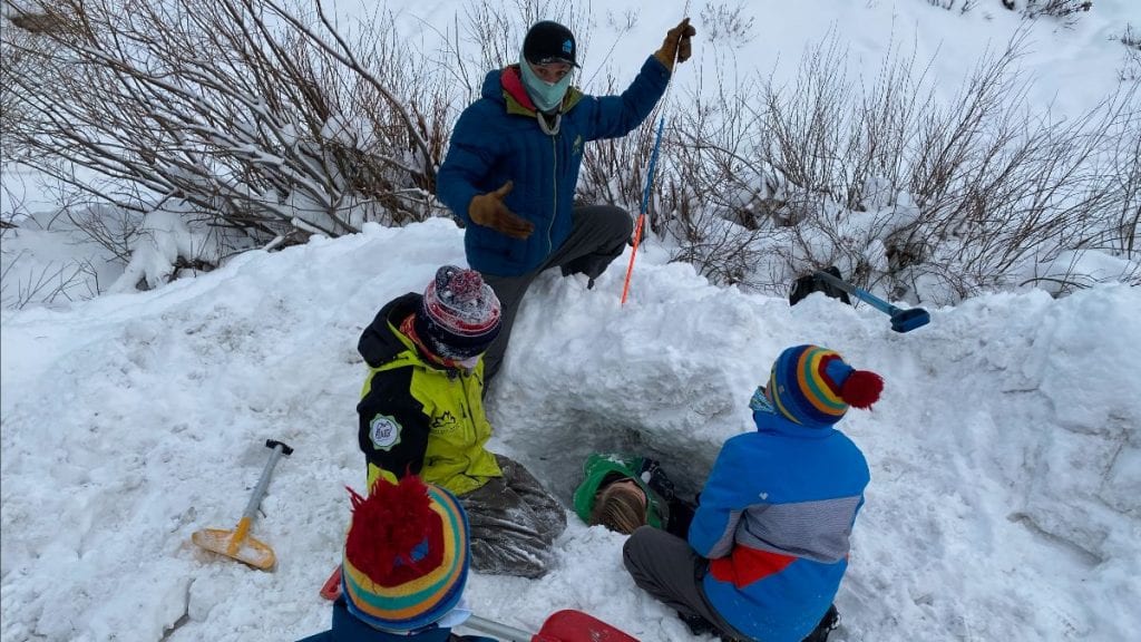 Local youth learning avalanche safety