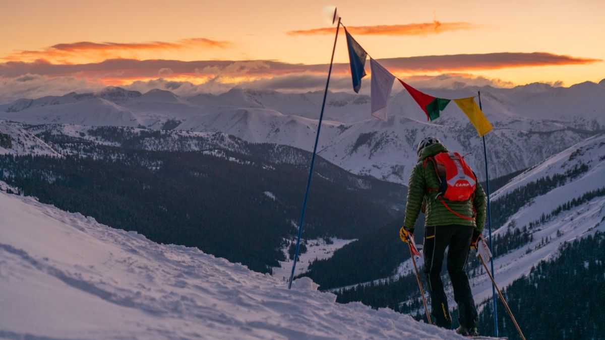 Grand Traverse skier at sunrise