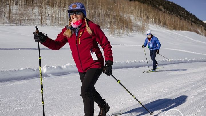 Smiling skier in a Crested Butte Nordic Masters clinic