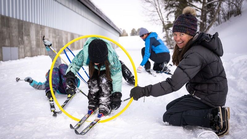 Local youth playing skills games on snow