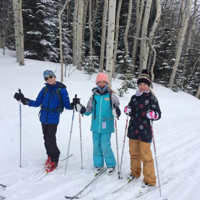Young skiers on powdery trails near Crested Butte