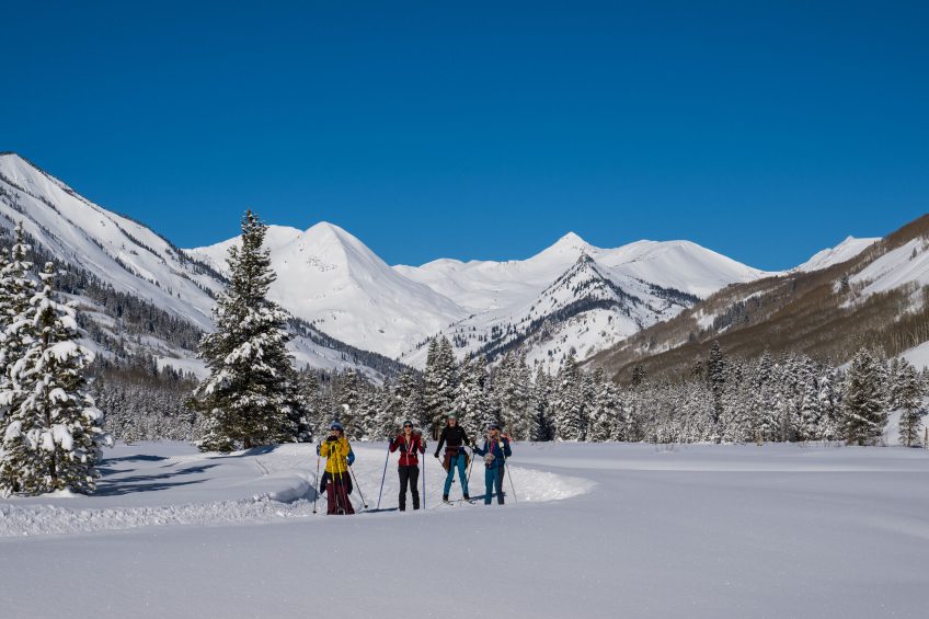 A group of skiers enjoy the West Side Trails